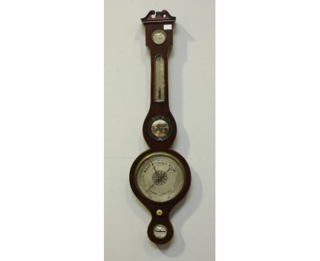 An Edwardian mercury wheel barometer with thermometer, hygrometer, small convex mirror and leveling feature, stained mahogany
