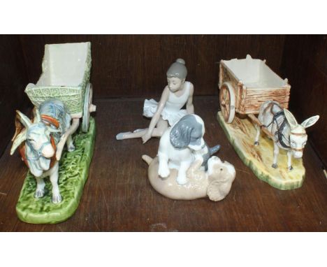 A pair of Royal Dux pottery figures of a donkey pulling a cart and a goat pulling a cart, together with two Nao figures of a 
