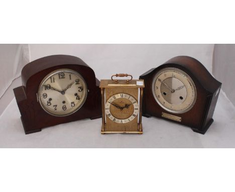 Three various clocks including a Junghans Electronic carriage clock and a Bentima mantel clock etc. 