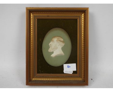 A Wedgwood Jasperware portrait medallion plaque, framed, depicting Ludwig Mond, frame 20 cm x 17 cm.