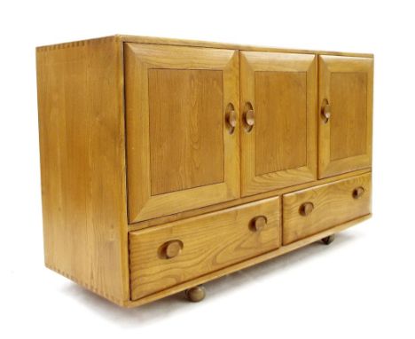 Ercol light elm sideboard, fitted with three cupboard doors over two drawers, 51" long, 30" high