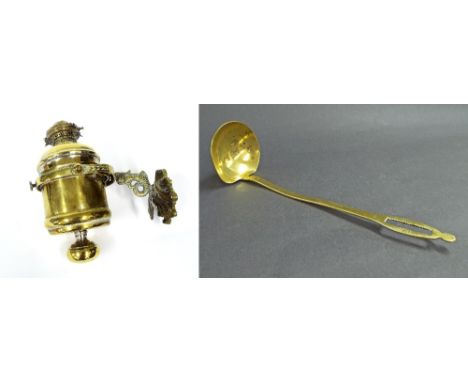 Brass oil wall lamp with cast arm in the form of a coiled serpent, 9" high; together a brass ladle