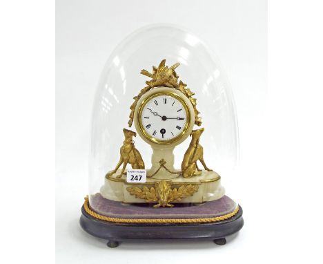 French alabaster and gilt metal figural mantel clock, the drumhead movement with 3.5" enamel dial flanked by seated hounds, 1