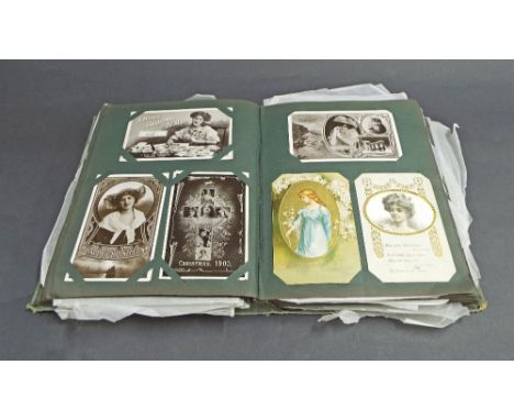 Vintage postcard album with various antique and later postcards