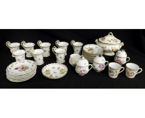 Collection of Continental porcelain, to include coffee cans and saucers and lidded wrythen fluted cups and covers; also a twi