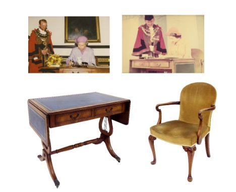 Georgian style stuffover carver chair and sofa table, both used by Queen Elizabeth II when she signed the visitors book at Ne