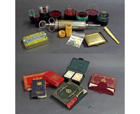 Box of interesting items to include collection of doctors/pharmacists measuring jugs, old coins, many packs of playing cards 