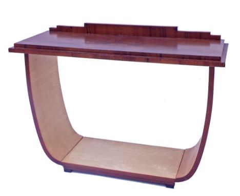 Art Deco walnut and maple console table, the moulded top with raised stepped back upon an arched base with satin interior upo