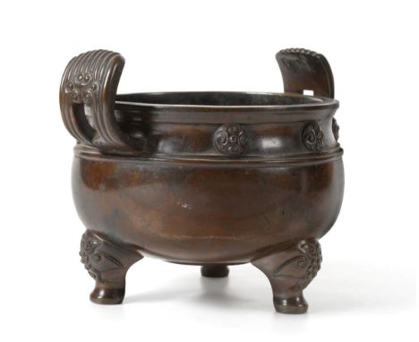 A Chinese Bronze Censer, Ding, bears six character Xuande reign mark, of ovoid form with reeded loop handles and a band of ro