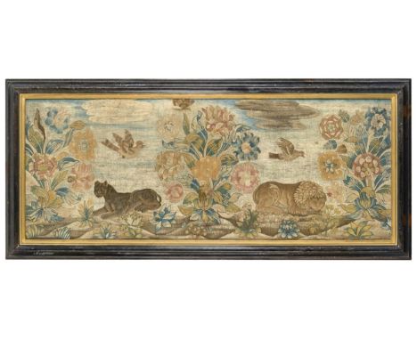 17th Century Silk Panel Worked in various stitches depicting a flowering leafy plant flanked by a lion and lioness, birds and