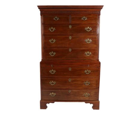 A George III Mahogany and Barber's Pole Strung Chest on Chest, late 18th century, the dentil cornice above a blind fret carve