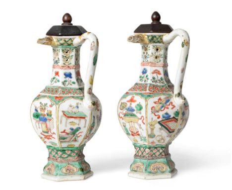 A Pair of Chinese Porcelain Puzzle Jugs, Kangxi, of hexagonal baluster form with pierced necks and loop handles, painted in f