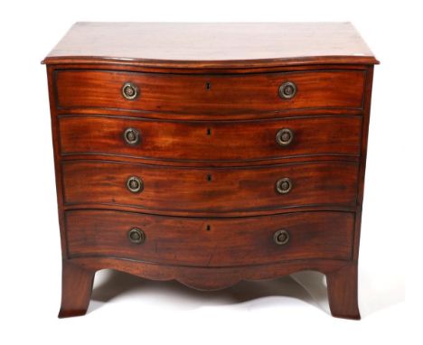 A George III Mahogany Serpentine Fronted Dressing Chest, basically 18th century, the moulded top above a fitted drawer of com