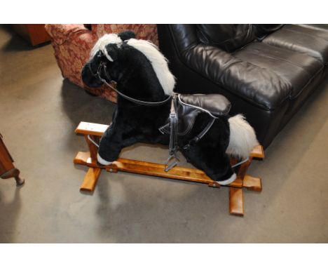 A Mamas &amp; Papas rocking horse
