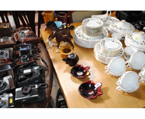 A Beswick model horse, Goebel model horse, Whisky water jugs, table lighter etc.