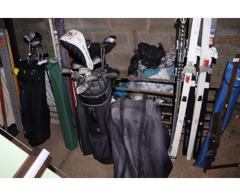 A Power Caddy golf bag and trolley and carry bag and contents of a Wilson driver, Calloway steel head woods and irons 