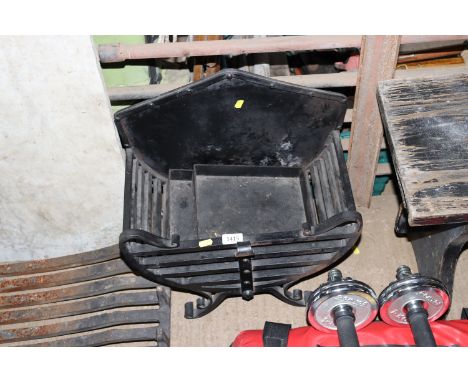 A cast iron fire grate and tray 