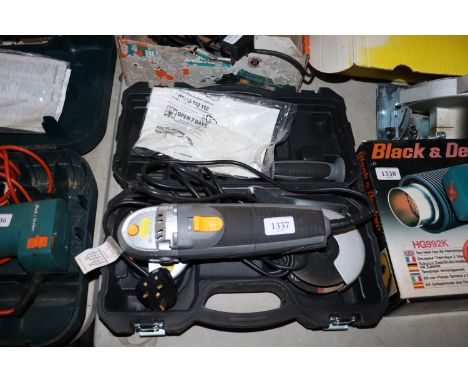 A Titan angle grinder; and a Black & Decker angle grinder 