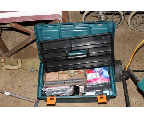 A plastic tool box and contents of various tools 
