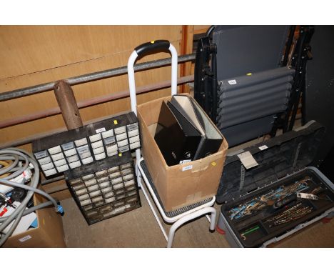 A step stool and box of folders 