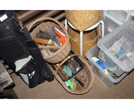 Two baskets containing various hand tools 