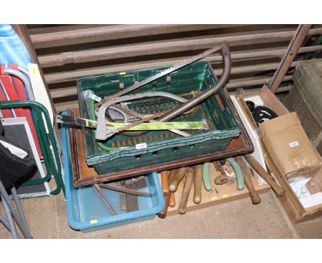 Three boxes of various hand tools and bow saws 
