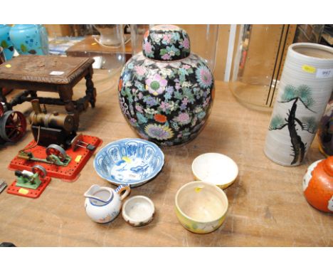 An Oriental blue and white bowl, a ginger jar with cover AF, various other pottery and a Quimper jug