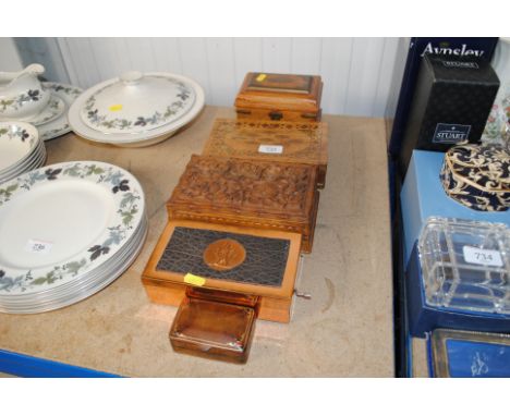 A collection of wooden trinket boxes, musical trinket box etc.