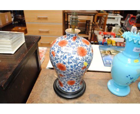An Oriental style vase converted to a table lamp