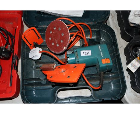 A Black & Decker sander in case