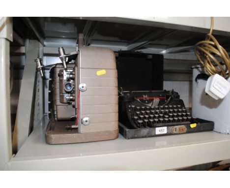 An Underwood typewriter and a Bell & Howell projector