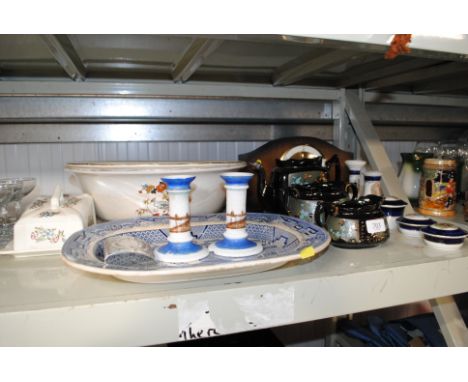 A three hole mantel clock, a wash bowl, blue and white 'Willow' pattern meat plate, a collection of tea ware, dressing table 
