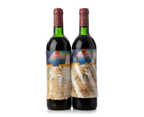 Two bottles of Château Mouton Rothschild 1984, Pauillac, France.Category: Red wine.75 cl.With damage to the labelling.Level: 