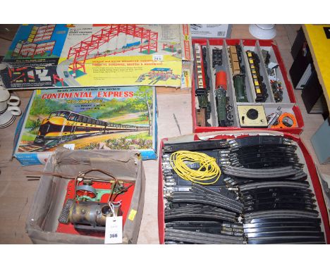A Trix twin railway set; a Mamod steam engine, boxed; H0 gauge battery operated Continental express railway set; together wit