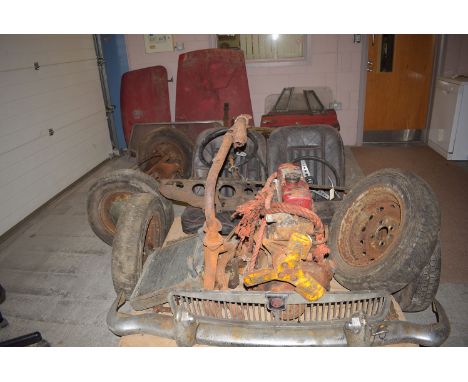 **TO BE SOLD AT 12 NOON**
A collection of parts from a 1964 M.G.B. Roadster.

NB
This vehicle was completely dismantled by th