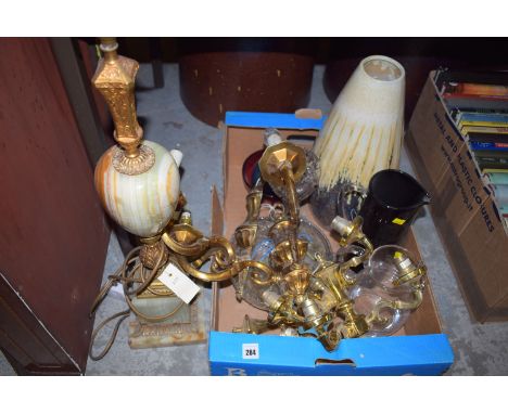 An onyx table lamp; six brass wall lights; a large pottery vase; two moulded glass bowls; and other glassware.