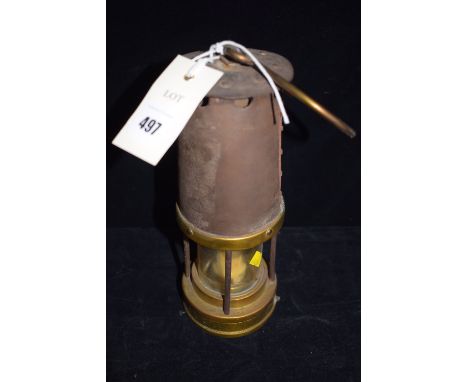 A Patterson of Newcastle upon Tyne Type B7 miner's lamp, steel bonnet, four steel bars with brass front (part converted to el