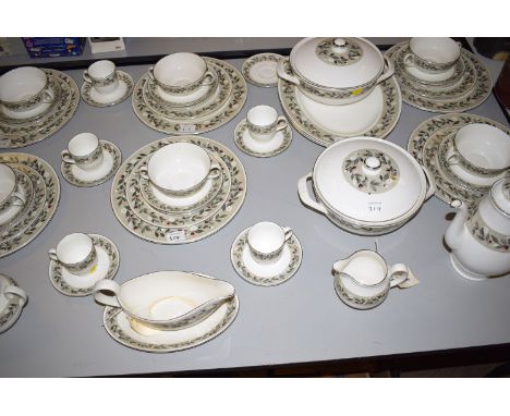 A Wedgwood 'Louisiana' pattern part dinner and tea service, floral decoration.