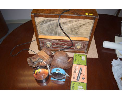 An Ecko Vintage radio; a pair of boxing gloves; a magnifier; an alarm clock; together with a picture light in original box.