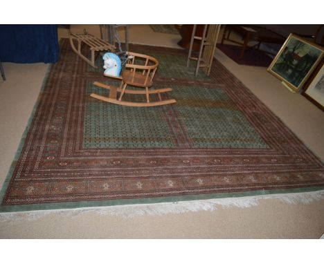 A 20th Century carpet, Turkestan, the four panel fields surrounded by multiple borders.