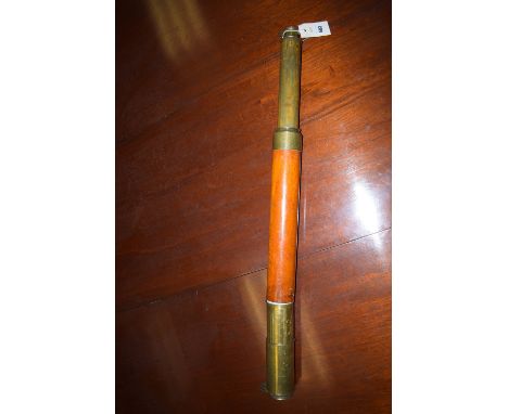 A 19th Century brass and mahogany one draw day or night telescope, by Benjamin Picke & Son, 166 Broadway, New York.