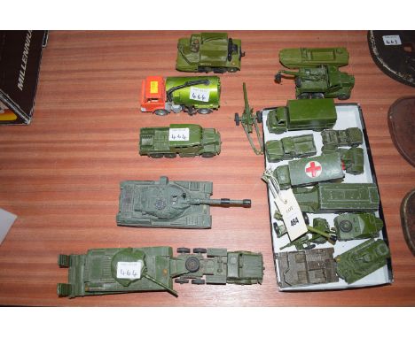 A collection of military Dinky toys, to include: a Chieftain Tank; together with a tank transporter no. 660; a medium artille