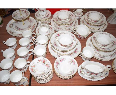 A Royal Albert 'Lavender Rose' pattern dinner service, to include: dinner plates, side plates, tea plates, bowls, tea cups an