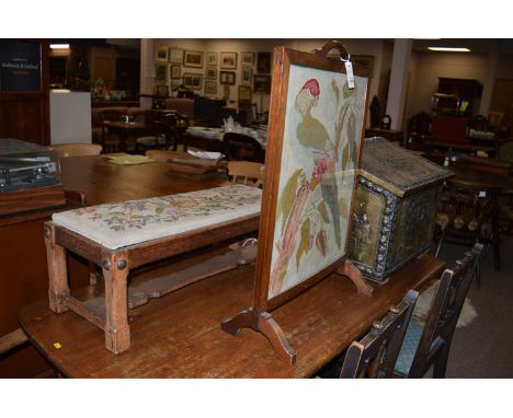 An embossed brass slipper box; a mahogany framed firescreen; and an oak stool.  (3)
