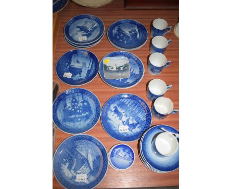 Eleven Royal Copenhagen blue and white plates, dates ranging from 1972-1984; together with six Royal Copenhagen coffee cans a