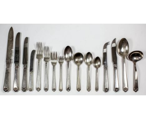 A George VI and Elizabeth II harlequin silver table service for ten place settings, the tapered handles with gadroon mounts, 