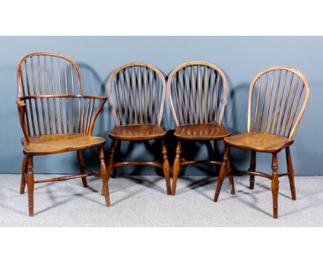 A 19th Century yew wood and elm seated two tier stick back Windsor armchair with dished wood seat and on turned underframe, a