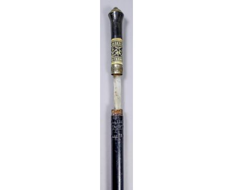 A 20th Century Indian composite walking cane sword stick with ebonised shaft, the 24.5ins blade with "India" pecked to one si