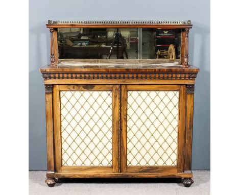 A William IV rosewood chiffonier, the mirror panelled back fitted one shelf with gilt brass gallery and turned, reeded and mo