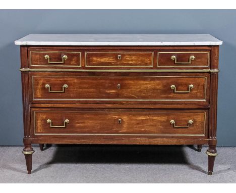 A 19th Century French mahogany and brass mounted commode of "Empire" design, with white veined marble slab to top, fitted thr